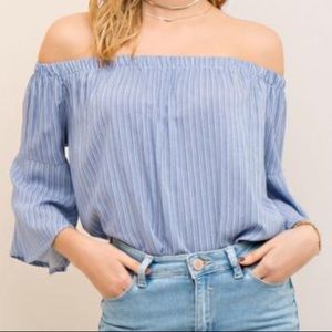 Blush striped off the shoulder shirt.